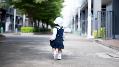 Toddler walking on street