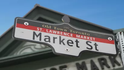 A street sign reads Old Town Toronto, St. Lawrence Market, Market Street
