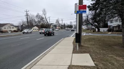 WMATA bus stop with sign and no bench or shelter in Washington, D.C.
