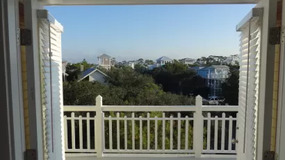 view out a window of rooftops of Seaside, Florida