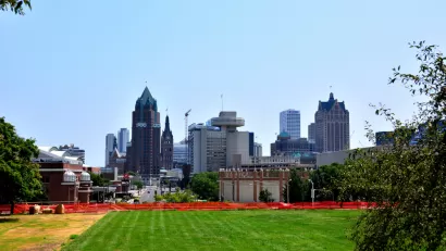 View of green grass lawn and downtown Milwaukee skyline