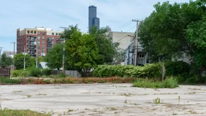 Vacant lot in Chicago, Illinois with skyline in background