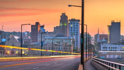 Sunset view of downtown Youngstown, Ohio over a bridge