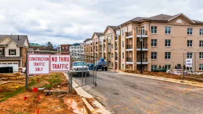 Construction site with 4-story apartment buildings in progress
