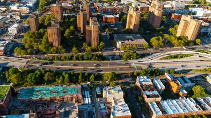 Aerial view of traffic on road and buildings in the Bronx, New York City
