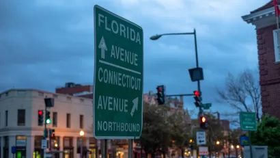 A sign near Dupont Circle gives directions to Florida Avenue and Connecticut Avenue, which are both major roads in the city.