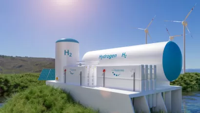 3D rendering of a hydrogen storage facility with wind turbines in background