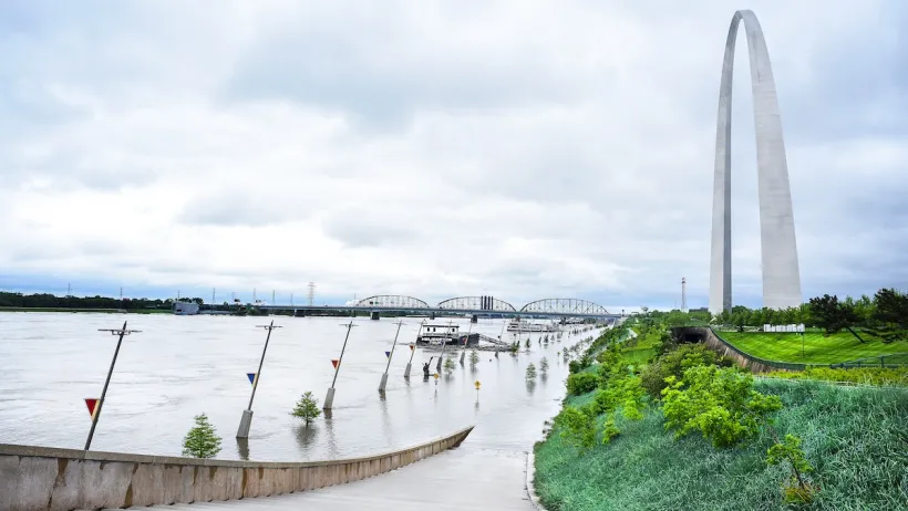 Flooded Mississippi River next to Gateway Arch in St. Louis, Missouri.