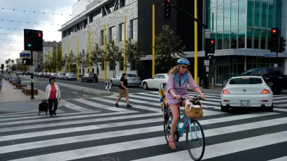 Crosswalk with cyclist and pedestrians in Santa Monica, California