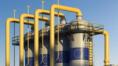 Four natural gas storage tanks with European Union flag logos