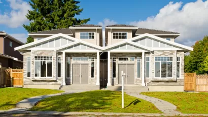 Duplex with twin two-story homes