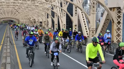 People biking across the Queensboro Bridge