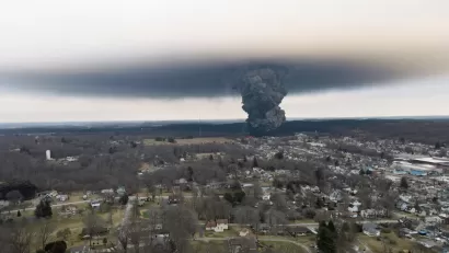 Gray chemical cloud seen from a distance from train derailment in Palestine, Ohio