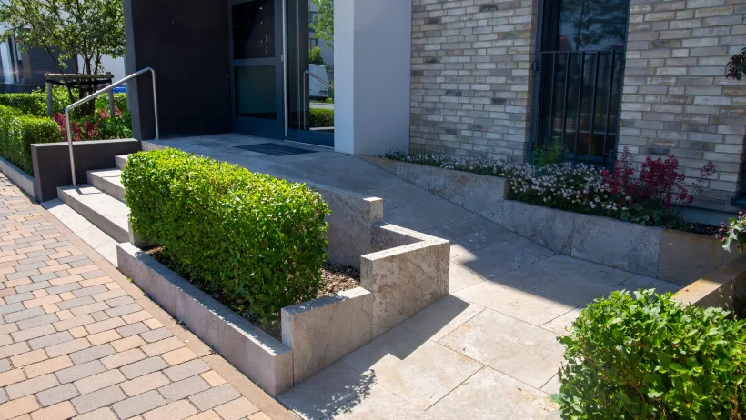 A wheelchair ramp provides access to a building.