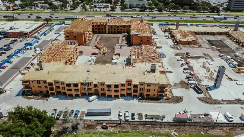 Large wood-frame apartment complex under construction in Dallas, Texas.