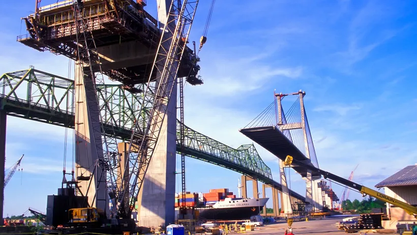Tall bridge or overpass under construction.