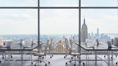 Workplaces in a modern panoramic office, New York city view from the windows. Open space. Black tables and brown leather chairs. A concept of financial consulting services. 3D rendering.