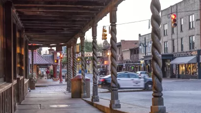 View down covered sidewalk in historic Stockyards district in Fort Worth, Texas