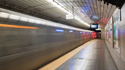 Jersey City, NJ - November 13, 2016: Train passing through the Exchange Place PATH station located at Exchange Place in Jersey City, New Jersey, adjacent to the Hudson River at Paulus Hook.