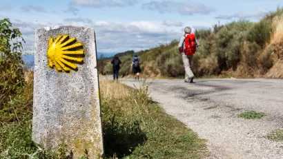 People walking on the Camino de Santiago trail in Spain