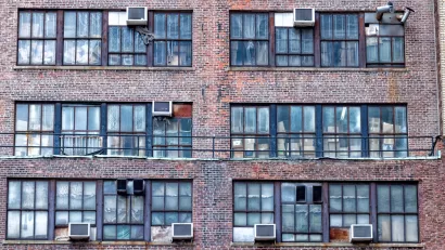 Window air conditioner units on a brick building