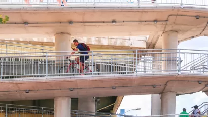 Bike rider on multi-tiered Philadelphia bridge