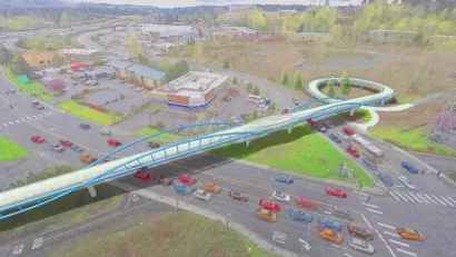 Rendering of pedestrian and bike bridge over multilane road