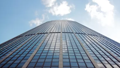 View of sky reflected in windows of Tour Montparnasse in Paris