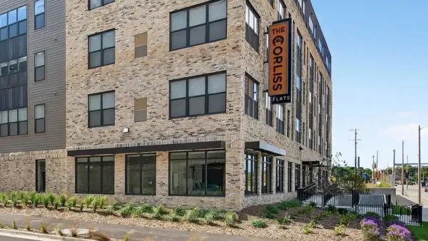 Multi-story light brick apartment building in Milwaukee, Wisconsin.
