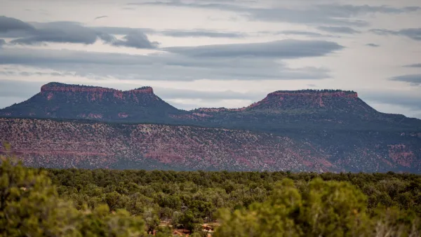Two mountains with flat tops, resembling bear ears.