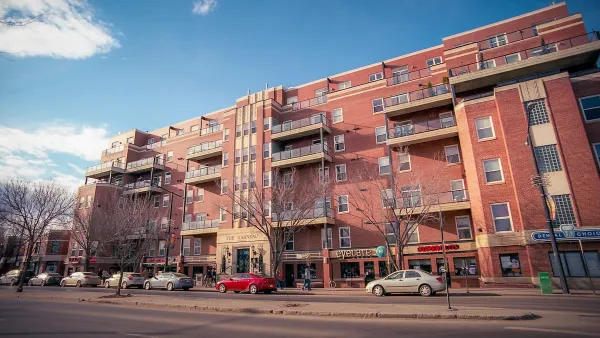 Red brick five-story multifamily housing building in Edmonton, Alberta, Canada.