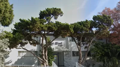 Google street view of two-story white apartment building in Los Angeles, California with "Key West 1940" text above entrance.