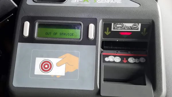Close-up on fare box on bus.