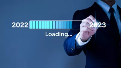 A computer generated graphic of a man loading 2022, approaching 2023.