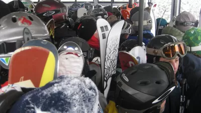 skiers on a tram