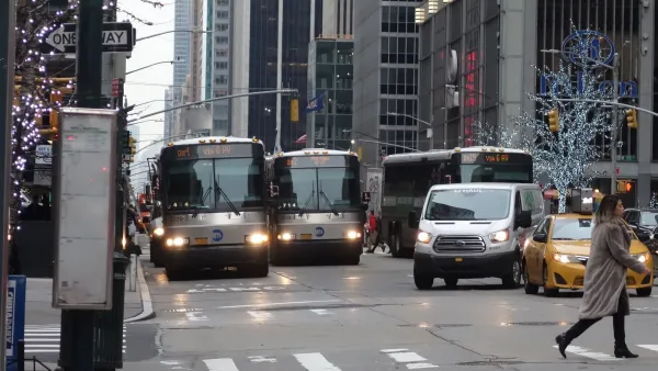Buses on 6th Ave, NYC
