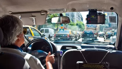 Interior of taxi with driver in Buenos Aires, Argentina