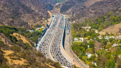 Traffic on the 405 interstate freeway through the Sepulveda Pass at Getty Center Drive in Los Angeles, California