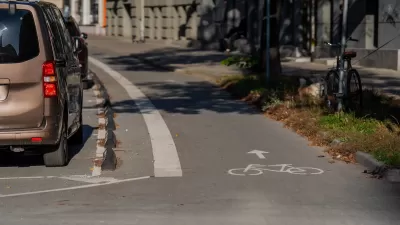 Parking protected bike lane in Riga, Latvia.