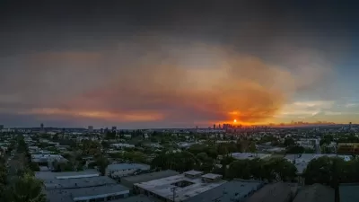 Smoky sky overlooking Los Angeles skyline during 2025 wildfires.