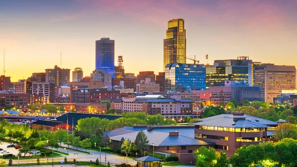 Downtown Omaha, Nebraska skyline at dusk.