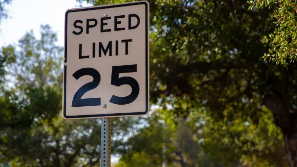 Black and white 25 mph speed limit sign.