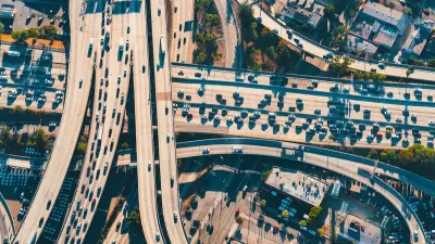 Aerial view of massive Los Angeles freeway interchange.