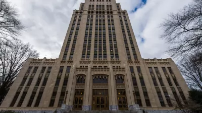 View looking up at high-rise Art Deco Atlanta City Hall building.