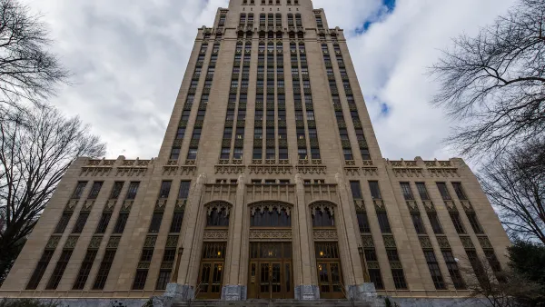 View looking up at high-rise Art Deco Atlanta City Hall building.