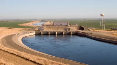 California Aqueduct channel in flat farmland area.