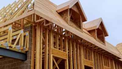 Wood-frame homes under construction.