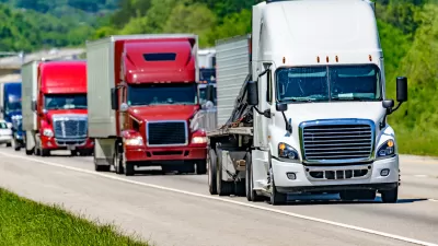 Line of 18-wheeler trucks on a highway in Tennessee