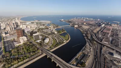 Aerial view of terminus of Los Angeles River and port infrastructure in Long Beach, California