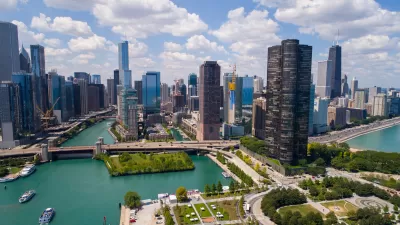 Aerial view of Chicago with river in foreground.
